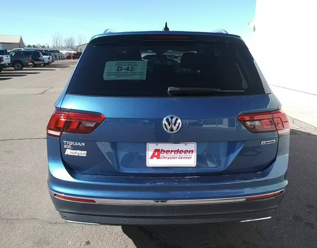 Volkswagen Tiguan Sel доставка в РФ из Америки цена